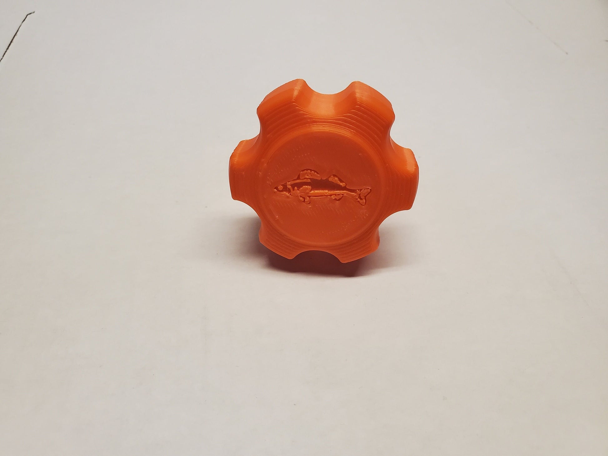 photo of top of orange knob