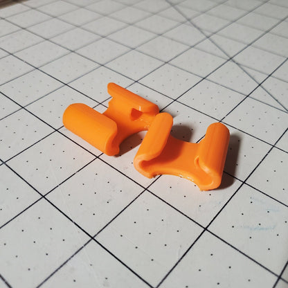 photo of two bungee clips