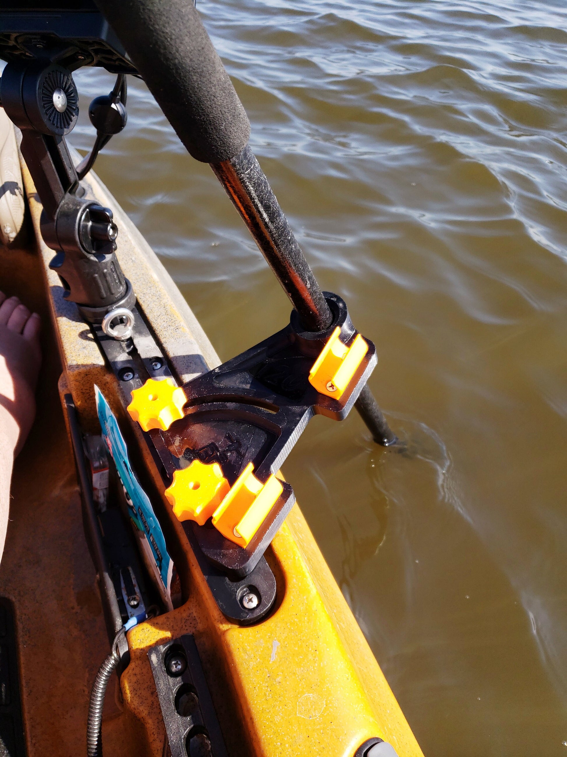 Image of the Stake-n-Stow deployed with a stake holding the kayak